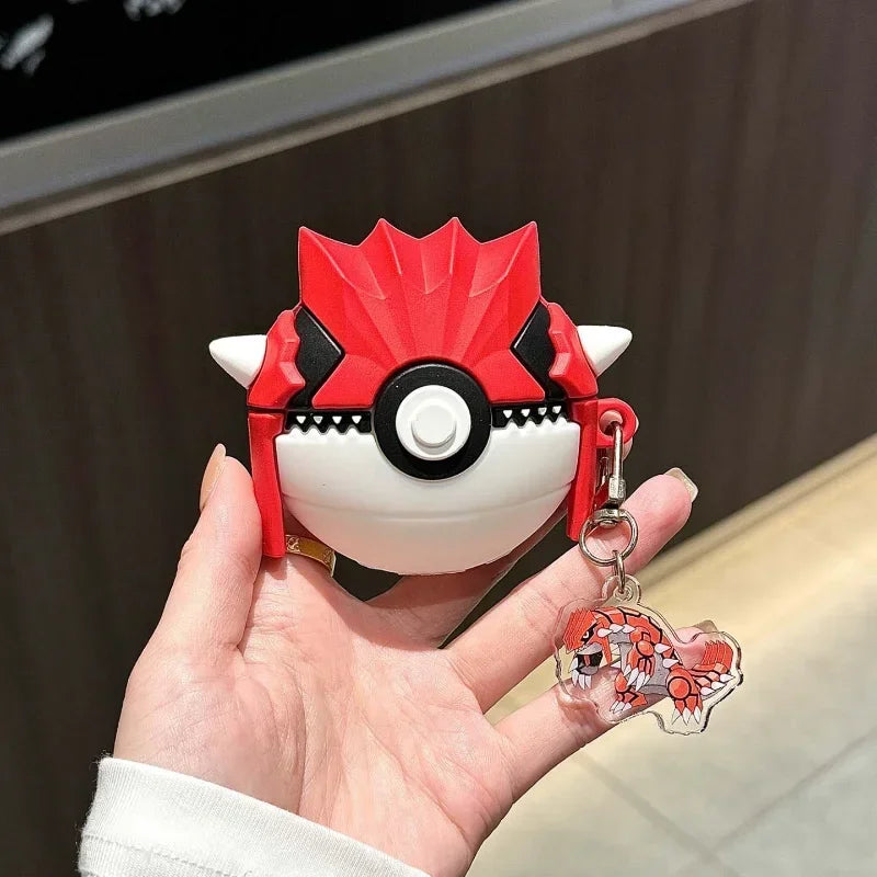 Coque AirPods Groudon avec chaînette et pendentif, tenue en main
